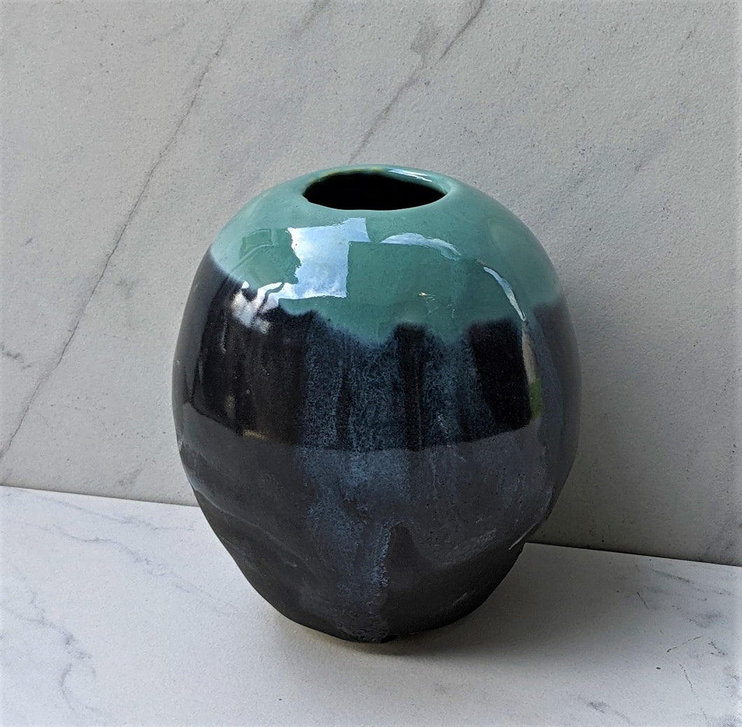 Small Round Globe Vase with Matte Black Base and Robin's Egg Blue Glaze Inside and Dripping from Lip
