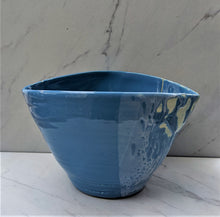 Load image into Gallery viewer, Blue glazed medium lemon-shaped pot with intermittent white glaze and rough clay. Pot does have a significant crack down the side