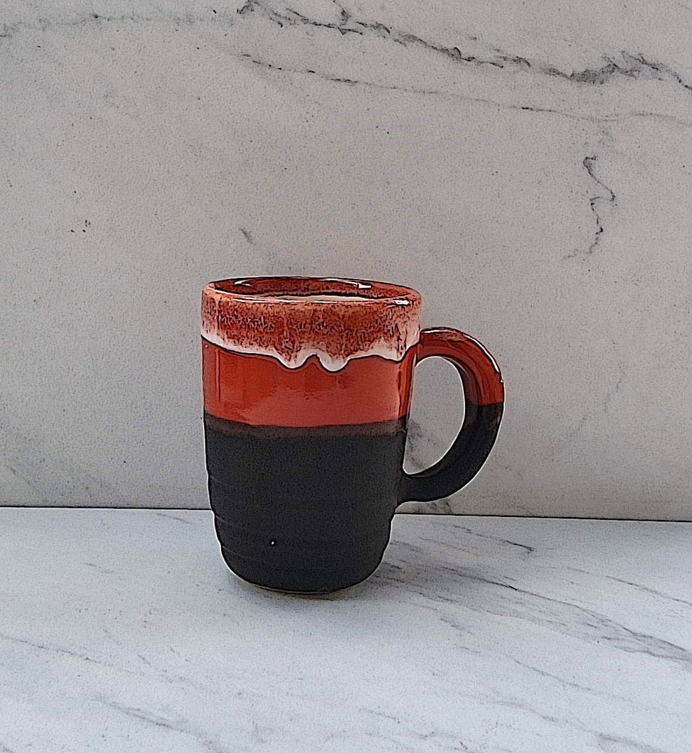 See Me Cane Mug with Matte Black Base, a Red Glazed Middle and White Glazed Inside and Lip.